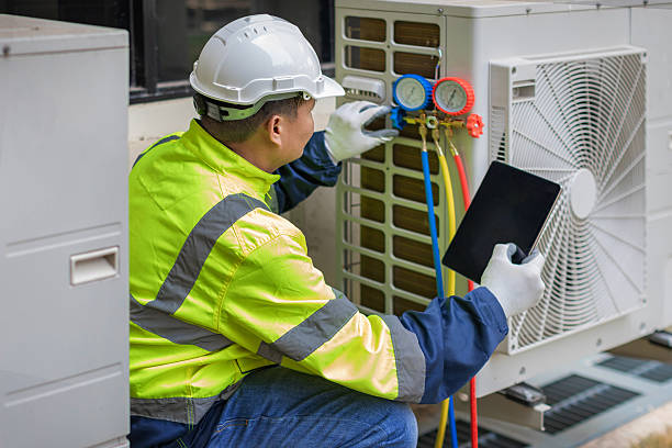Professional Hvac Installation technician working in Oakwood, GA